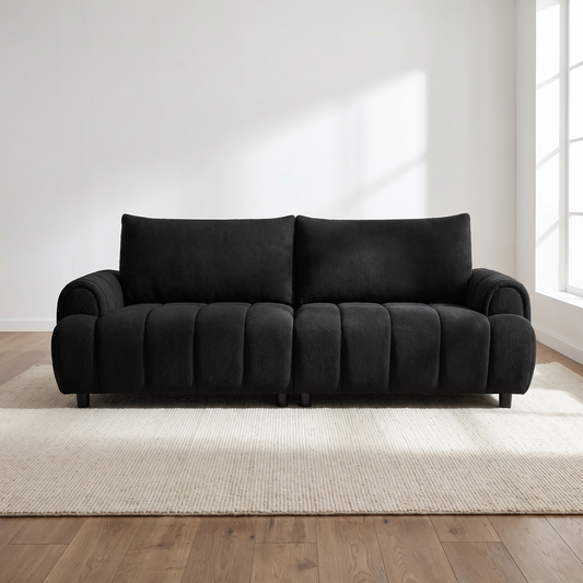 Bexley sofa seen straight on with daylight on the channelled cushions