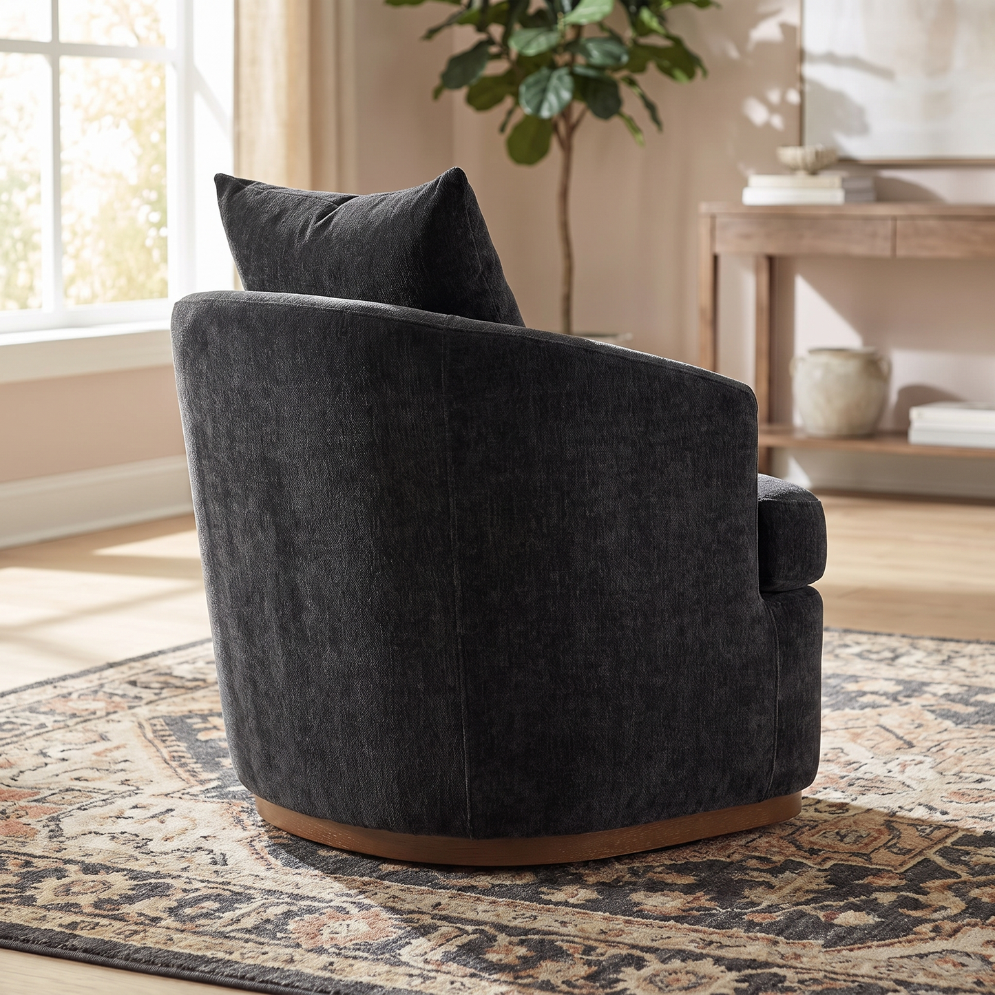 Ridley chair from behind showing the curved back and low arms