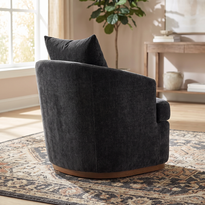 Ridley chair from behind showing the curved back and low arms