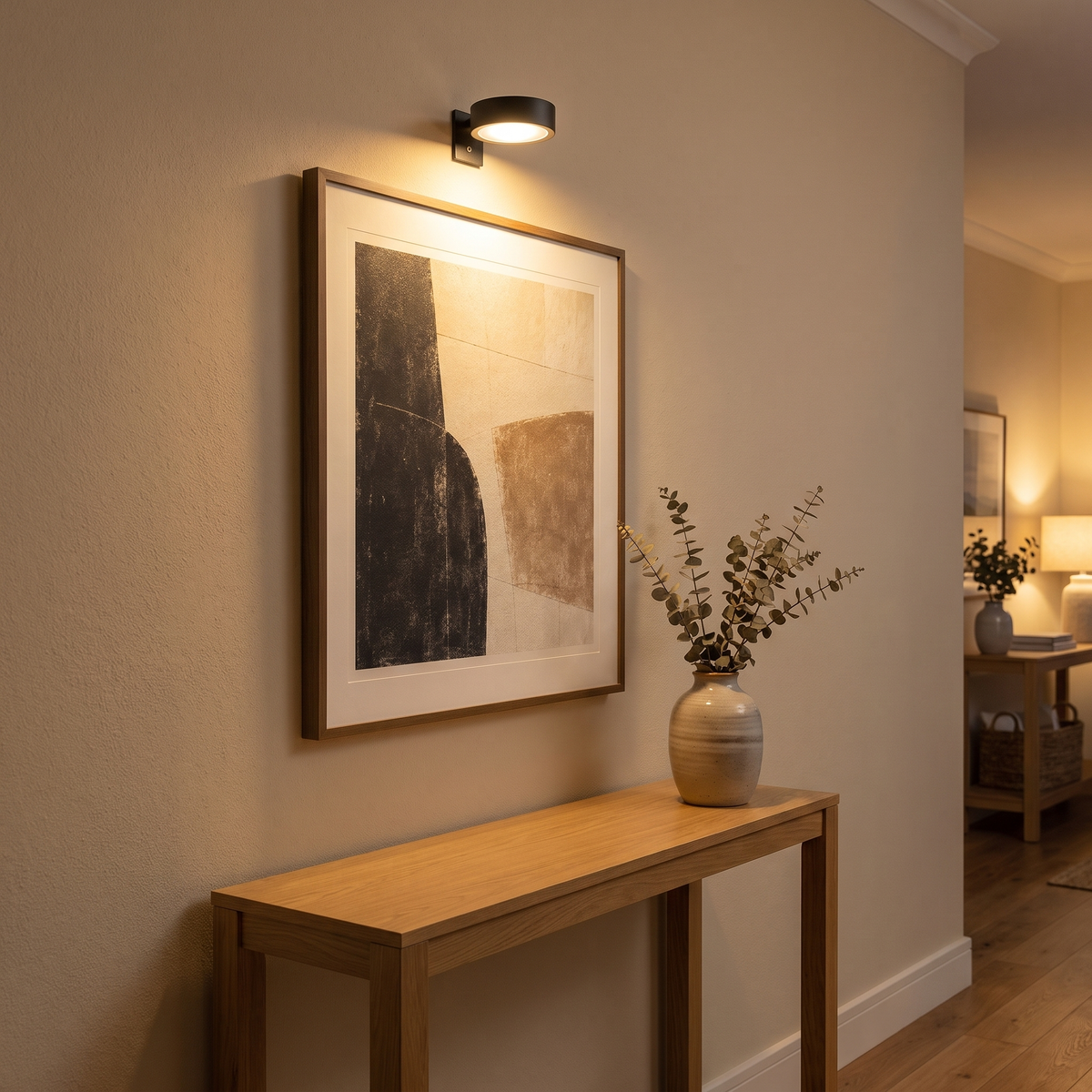 Orla cordless round art spotlight, rechargeable LED picture light above wall art
